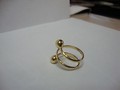 Спиральное женское кольцо желтого золота 585 пробы сделано на заказ